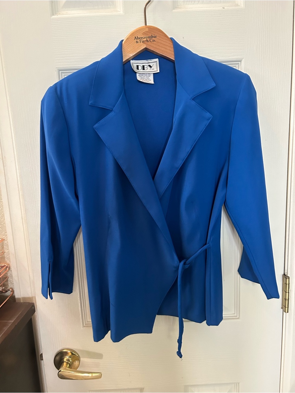 DBX Women's Cobalt Blue Wrap Blazer with Self-Tie Waist and matching skirt.